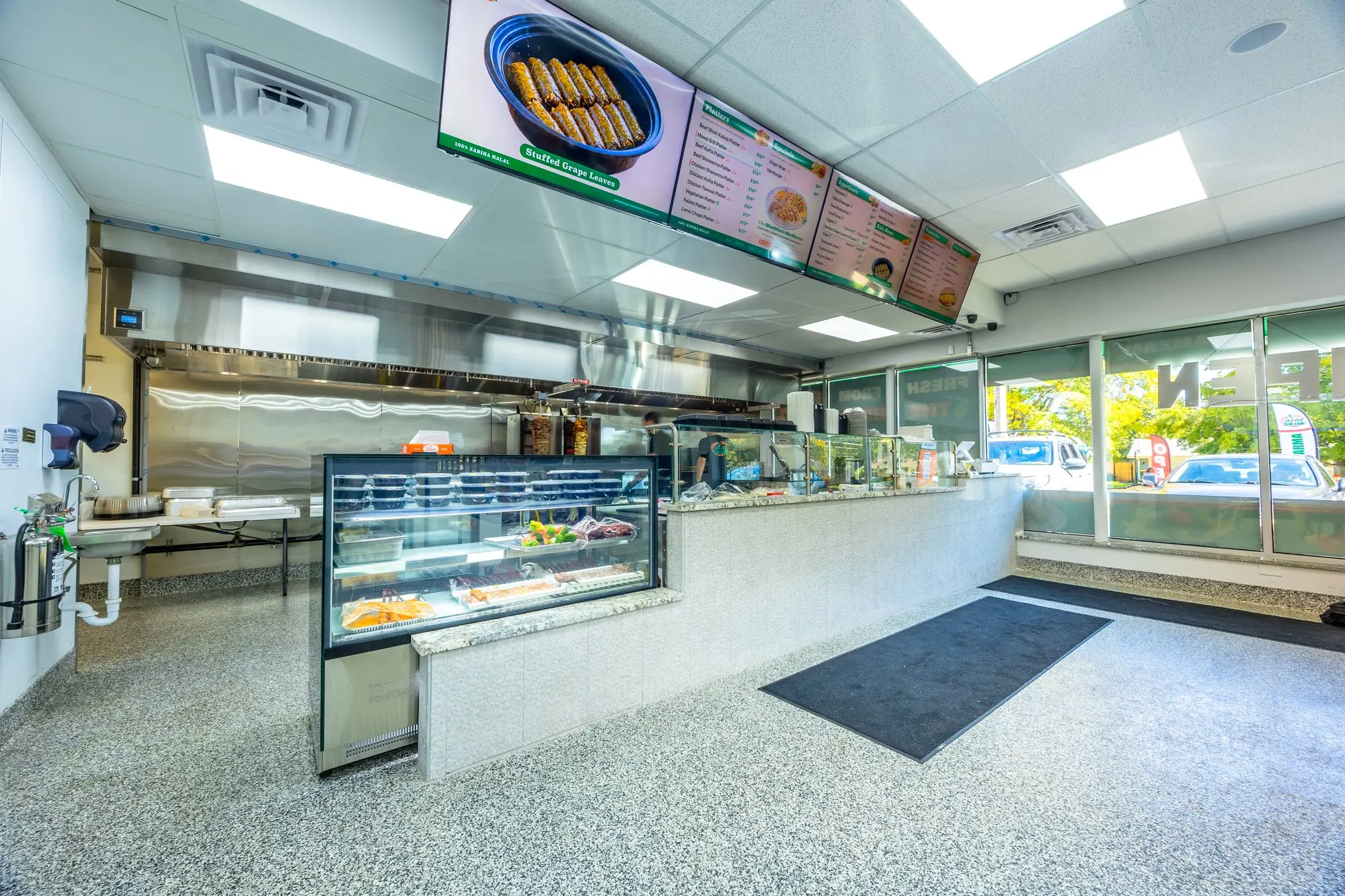 The ZAMZAM restaurant counter and display case.